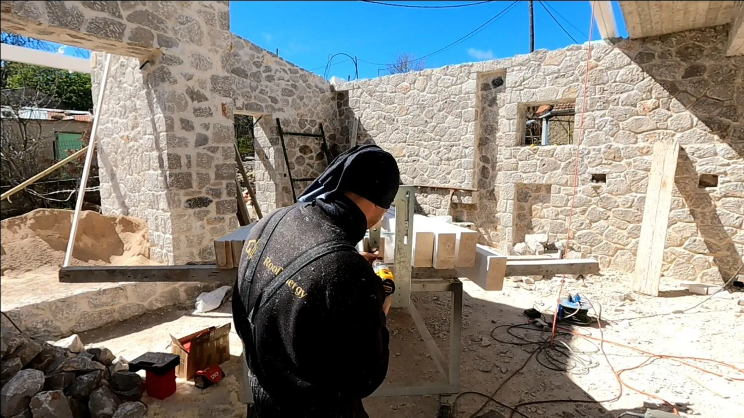Roof Energy craftsman working dovetail joints on site